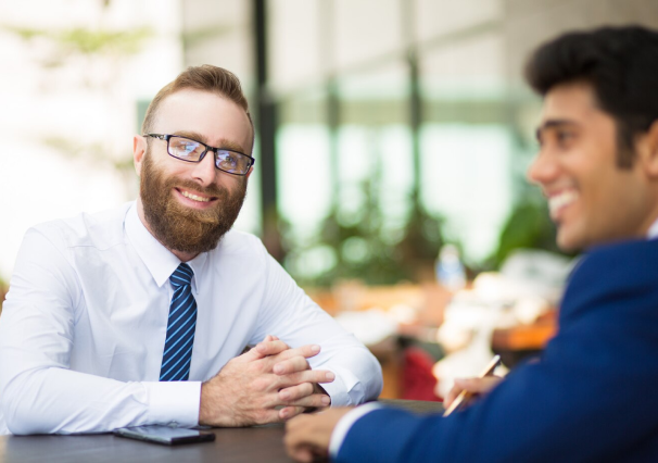 Two businessmen in conversation